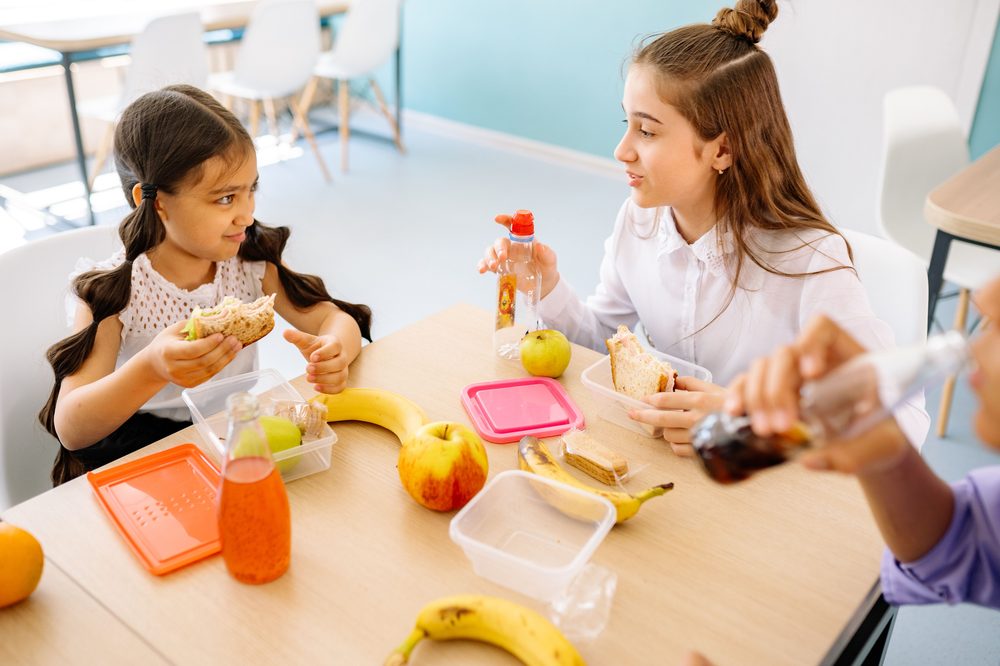 Students sharing a healthy lunch together