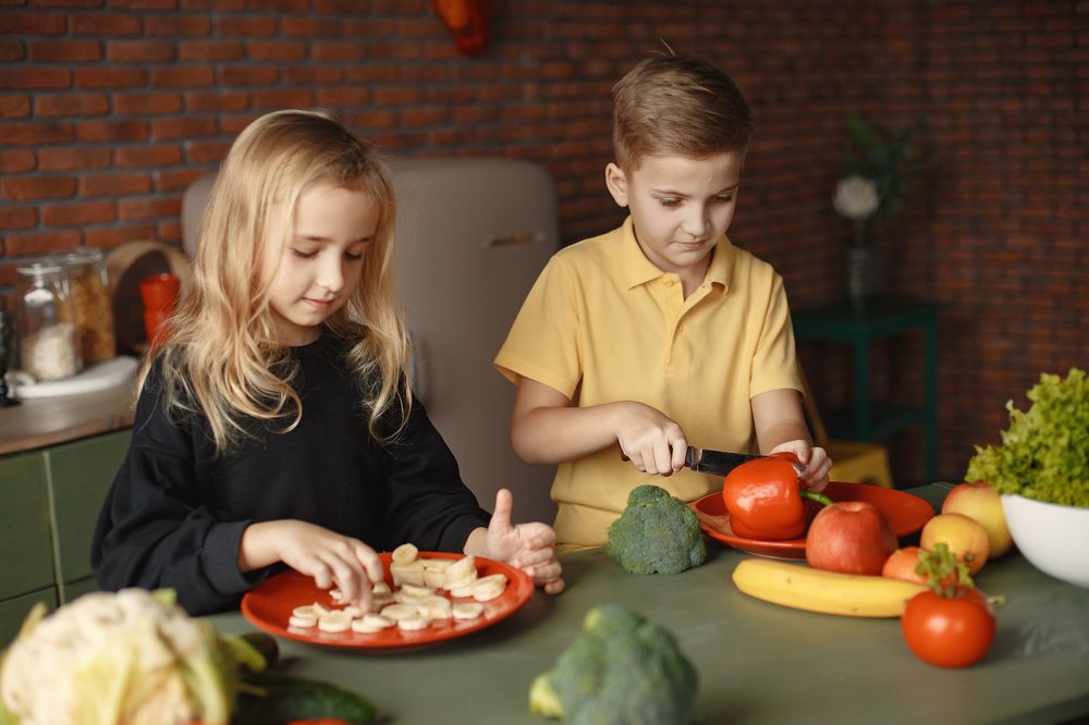 Students preparing fruits and vegetables